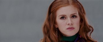 Movie still from “Confessions of a Shopaholic” (2009), directed by P.J. Hogan – A person with long red hair; Close Up shot, Low angle
