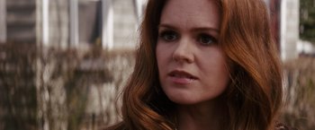 Movie still from “Confessions of a Shopaholic” (2009), directed by P.J. Hogan – A person with long hair; Close Up shot, Over the shoulder angle