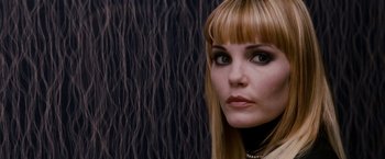 Movie still from “Confessions of a Shopaholic” (2009), directed by P.J. Hogan – A person wearing a dress; Close Up shot, Over the shoulder angle