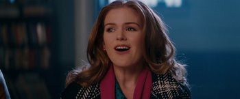 Movie still from “Confessions of a Shopaholic” (2009), directed by P.J. Hogan – A person wearing a scarf; Close Up shot, Over the shoulder angle