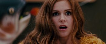 Movie still from “Confessions of a Shopaholic” (2009), directed by P.J. Hogan – A person with long hair; Close Up shot, Low angle