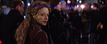 Movie still from “Contact” (1997), directed by Robert Zemeckis – A person wearing a purple headband; Close Up shot, Over the shoulder angle