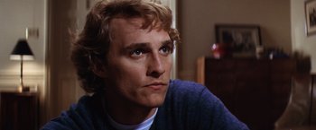 Movie still from “Contact” (1997), directed by Robert Zemeckis – A person looking at the camera; Close Up shot, Over the shoulder angle