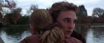 Movie still from “Contact” (1997), directed by Robert Zemeckis – A person with their head on a shoulder; Close Up shot, Over the shoulder angle