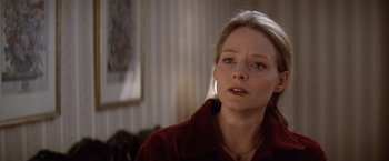 Movie still from “Contact” (1997), directed by Robert Zemeckis – A person wearing a red shirt; Close Up shot, Over the shoulder angle