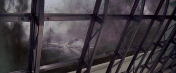 Movie still from “Contact” (1997), directed by Robert Zemeckis – A view of a city from inside a building; Extreme Wide shot, Low angle