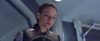 Movie still from “Contact” (1997), directed by Robert Zemeckis – A person wearing a helmet; Close Up shot, Low angle