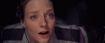 Movie still from “Contact” (1997), directed by Robert Zemeckis – A person with blue eyes; Close Up shot, Overhead angle