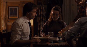 Movie still from “The Front Runner” (2018), directed by Jason Reitman – A man and a woman sitting at a dinner table; Medium shot, Over the shoulder angle