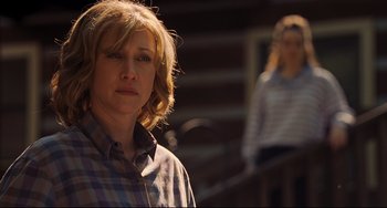 Movie still from “The Front Runner” (2018), directed by Jason Reitman – A woman standing next to another woman on a porch; Close Up shot, Over the shoulder angle