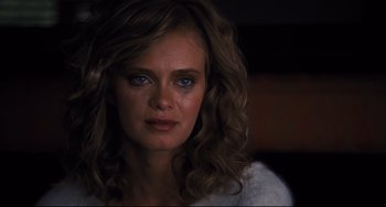 Movie still from “The Front Runner” (2018), directed by Jason Reitman – A person with long curly hair; Close Up shot, Over the shoulder angle