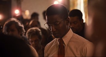 Movie still from “The Front Runner” (2018), directed by Jason Reitman – A man in a white shirt and a red neck tie; Close Up shot, Over the shoulder angle