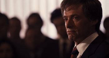 Movie still from “The Front Runner” (2018), directed by Jason Reitman – A person wearing a suit and tie; Close Up shot, Low angle
