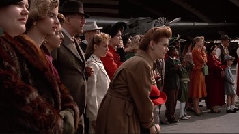 Movie still from “Cool World” (1992), directed by Ralph Bakshi – A group of people standing in a line; Medium shot, Low angle