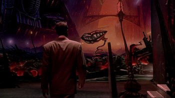 Movie still from “Cool World” (1992), directed by Ralph Bakshi – A man standing in front of a painting; Extreme Wide shot, Low angle
