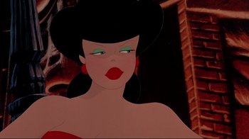 Movie still from “Cool World” (1992), directed by Ralph Bakshi – A woman's face with a black hat; Close Up shot, Low angle