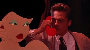 Movie still from “Cool World” (1992), directed by Ralph Bakshi – A man and a woman are looking at each other; Close Up shot, Low angle