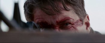 Movie still from “Cop Car” (2015), directed by Jon Watts – A man's face with blood on it; Extreme Close Up shot, Low angle