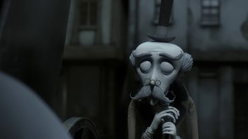 Movie still from “Corpse Bride” (2005), directed by Tim Burton – A creepy doll with a mustache and a hat; Close Up shot, Over the shoulder angle