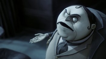 Movie still from “Corpse Bride” (2005), directed by Tim Burton – An image of an animated character in a suit and tie; Close Up shot, Low angle