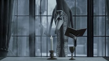 Movie still from “Corpse Bride” (2005), directed by Tim Burton – A candle and a candle holder with a candle and a book; Medium shot, Over the shoulder angle