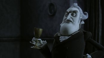 Movie still from “Corpse Bride” (2005), directed by Tim Burton – A character holding a goblet; Close Up shot, Over the shoulder angle