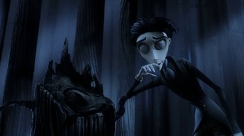 Movie still from “Corpse Bride” (2005), directed by Tim Burton – The animated movie frankenweenie is shown in this scene; Medium shot, Over the shoulder angle