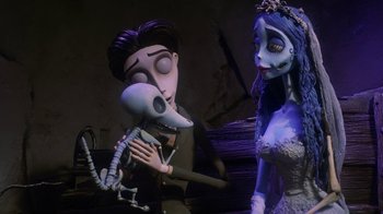 Movie still from “Corpse Bride” (2005), directed by Tim Burton – The corpse bride and the corpse groom are in a dark room; Medium shot, Over the shoulder angle