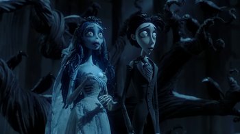 Movie still from “Corpse Bride” (2005), directed by Tim Burton – A bride and a groom are standing next to each other; Medium shot, Low angle