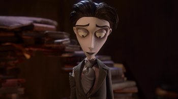 Movie still from “Corpse Bride” (2005), directed by Tim Burton – A doll of a man in a suit and tie; Close Up shot, Low angle