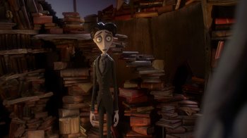 Movie still from “Corpse Bride” (2005), directed by Tim Burton – A man standing in front of a pile of books; Medium shot, High angle