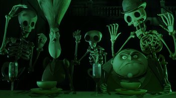 Movie still from “Corpse Bride” (2005), directed by Tim Burton – A group of people sitting at a table; Medium shot, Low angle