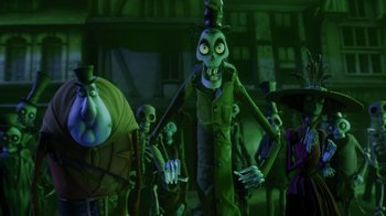 Movie still from “Corpse Bride” (2005), directed by Tim Burton – A group of people dressed up in green costumes; Medium shot, Low angle