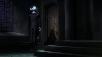 Movie still from “Corpse Bride” (2005), directed by Tim Burton – A man in a suit and hat standing in front of a door; Wide shot, Over the shoulder angle