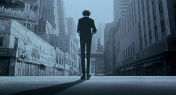 Movie still from “Cowboy Bebop: The Movie” (2001), directed by Yoshiyuki Takei – A man in a suit standing in the middle of a street; Wide shot, Low angle
