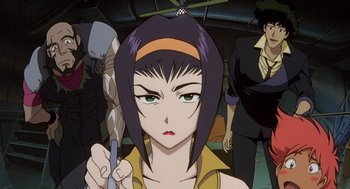 Movie still from “Cowboy Bebop: The Movie” (2001), directed by Yoshiyuki Takei – A woman is holding a knife in front of a group of people; Close Up shot, Low angle