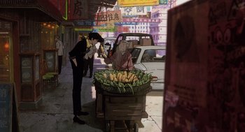 Movie still from “Cowboy Bebop: The Movie” (2001), directed by Yoshiyuki Takei – A man standing in front of a cart full of bananas; Wide shot, High angle