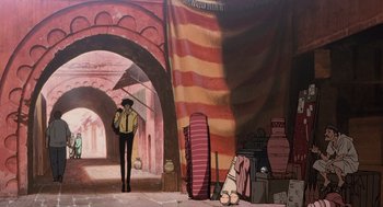 Movie still from “Cowboy Bebop: The Movie” (2001), directed by Yoshiyuki Takei – A man standing in front of an archway in an alley; Wide shot, Low angle