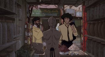 Movie still from “Cowboy Bebop: The Movie” (2001), directed by Yoshiyuki Takei – A group of people standing around in a market; Medium shot, Over the shoulder angle