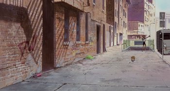 Movie still from “Cowboy Bebop: The Movie” (2001), directed by Yoshiyuki Takei – An old building with graffiti on the side of the building; Extreme Wide shot, High angle
