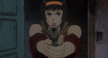 Movie still from “Cowboy Bebop: The Movie” (2001), directed by Yoshiyuki Takei – A woman is holding a gun in her hands; Close Up shot, Low angle