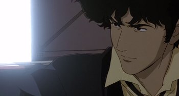 Movie still from “Cowboy Bebop: The Movie” (2001), directed by Yoshiyuki Takei – A person with a suit and tie on; Close Up shot, Low angle