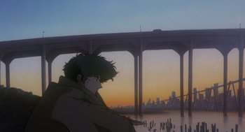 Movie still from “Cowboy Bebop: The Movie” (2001), directed by Yoshiyuki Takei – A man with a green hair sitting in front of a bridge; Wide shot, Low angle
