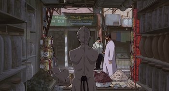 Movie still from “Cowboy Bebop: The Movie” (2001), directed by Yoshiyuki Takei – A man standing in front of two men in the street; Wide shot, Over the shoulder angle
