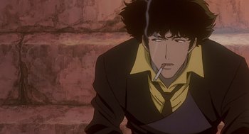 Movie still from “Cowboy Bebop: The Movie” (2001), directed by Yoshiyuki Takei – A man smoking a cigarette while sitting on a ledge; Close Up shot, Low angle