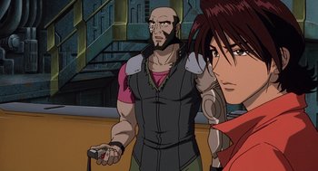 Movie still from “Cowboy Bebop: The Movie” (2001), directed by Yoshiyuki Takei – A man and a woman are playing a video game together; Close Up shot, Low angle