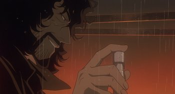 Movie still from “Cowboy Bebop: The Movie” (2001), directed by Yoshiyuki Takei – A man holding a cell phone while standing in the rain; Close Up shot, Low angle