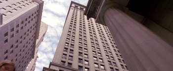 Movie still from “Coyote Ugly” (2000), directed by David McNally – Looking up at a very tall skyscraper in a city; Extreme Wide shot, Low angle