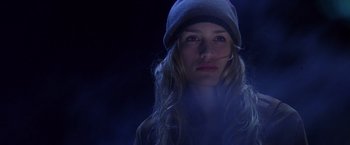 Movie still from “Coyote Ugly” (2000), directed by David McNally – A woman wearing a hat is looking at the camera; Close Up shot, Low angle