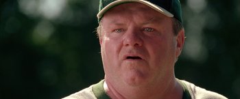 Movie still from “Coyote Ugly” (2000), directed by David McNally – A person wearing a hat; Close Up shot, Low angle